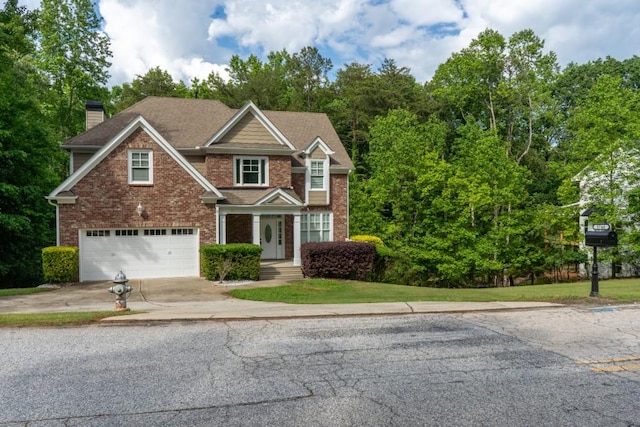 5746 Nix Bridge Rd, Gainesville, GA 30506 - view of front of property with driveway, a garage, brick siding, and a chimney