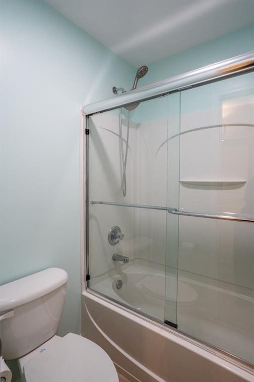 5746 Nix Bridge Rd, Gainesville, GA 30506 - bathroom featuring toilet and shower / bath combination with glass door