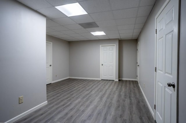 5746 Nix Bridge Rd, Gainesville, GA 30506 - spare room with wood finished floors, baseboards, and a paneled ceiling