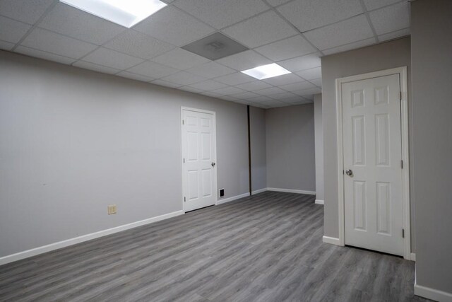 5746 Nix Bridge Rd, Gainesville, GA 30506 - finished basement featuring wood finished floors, a drop ceiling, and baseboards