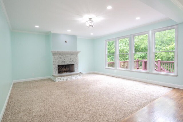 5746 Nix Bridge Rd, Gainesville, GA 30506 - unfurnished living room featuring crown molding, a fireplace, baseboards, recessed lighting, and a chandelier
