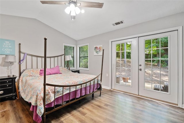10650 Colony Glen Dr, Johns Creek, GA 30022 - bedroom featuring access to outside, wood finished floors, lofted ceiling, ceiling fan, and french doors