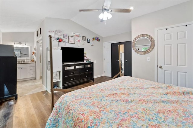 10650 Colony Glen Dr, Johns Creek, GA 30022 - bedroom with wood finished floors, lofted ceiling, baseboards, and ceiling fan