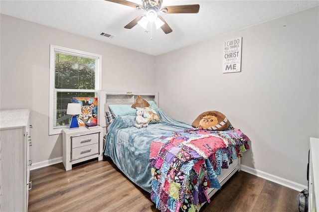 10650 Colony Glen Dr, Johns Creek, GA 30022 - bedroom featuring baseboards, wood finished floors, and ceiling fan