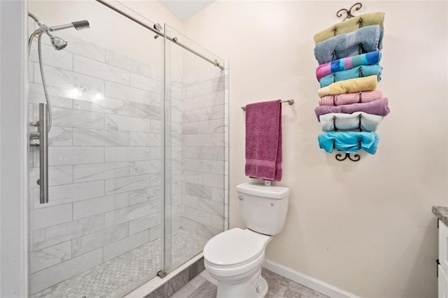 10650 Colony Glen Dr, Johns Creek, GA 30022 - bathroom featuring toilet, a shower stall, and baseboards