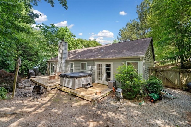 10650 Colony Glen Dr, Johns Creek, GA 30022 - rear view of house featuring french doors, a wooden deck, a chimney, and roof with shingles