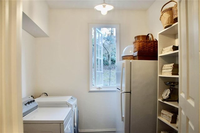 washroom with washer and dryer and laundry area