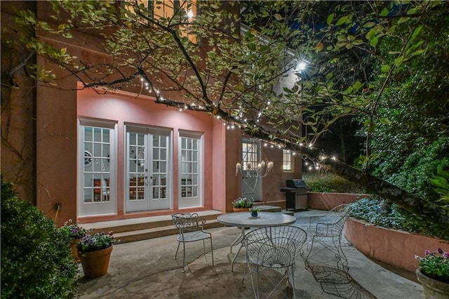 view of patio / terrace featuring grilling area and french doors