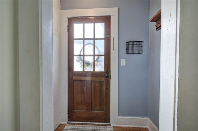 doorway to outside featuring a wealth of natural light