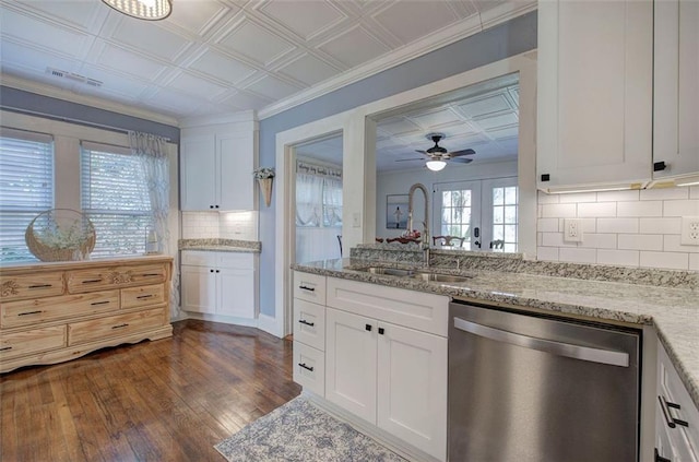 kitchen with an ornate ceiling, dark wood-style flooring, white cabinetry, a sink, and dishwasher