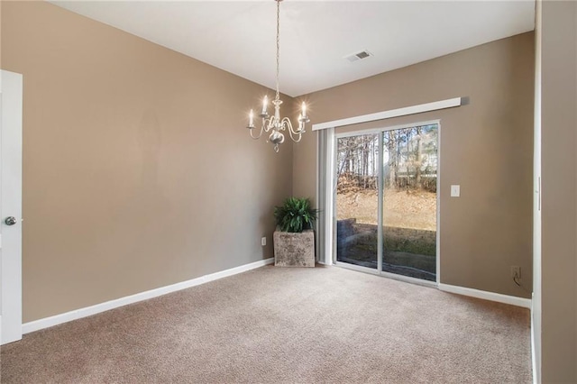 carpeted empty room featuring visible vents, baseboards, and an inviting chandelier