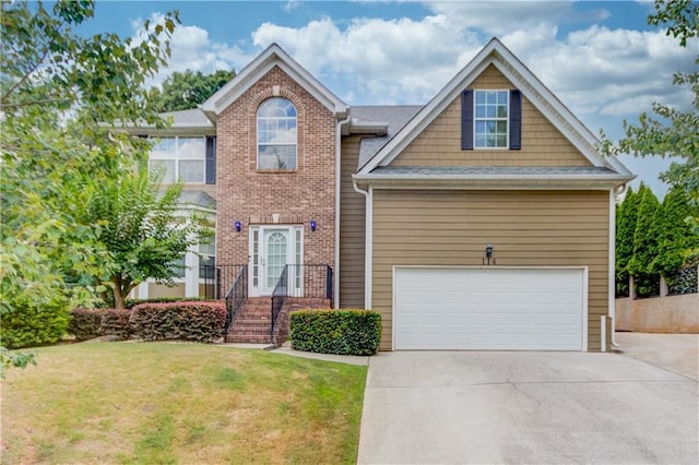 view of front of house featuring a garage, driveway, brick siding, and a front yard