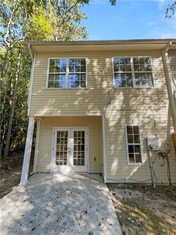 20 Pine Canyon Dr SW Unit 24, Atlanta, GA 30331 - rear view of house with french doors and a patio