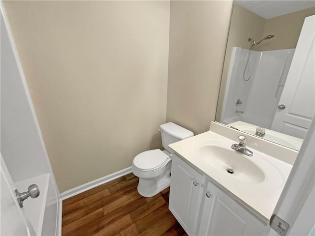 20 Pine Canyon Dr SW Unit 24, Atlanta, GA 30331 - bathroom with toilet, wood finished floors, vanity, and baseboards