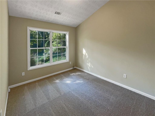 20 Pine Canyon Dr SW Unit 24, Atlanta, GA 30331 - carpeted spare room with visible vents, baseboards, and a textured ceiling