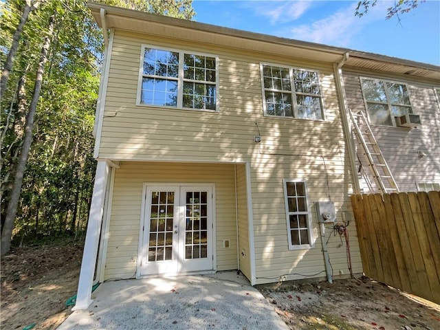 20 Pine Canyon Dr SW Unit 24, Atlanta, GA 30331 - back of house featuring cooling unit, french doors, and fence