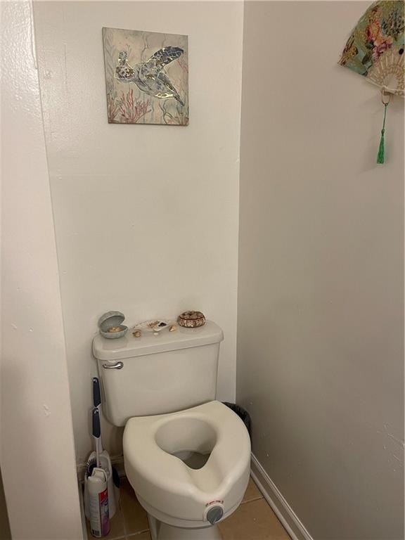 bathroom featuring tile patterned floors and toilet