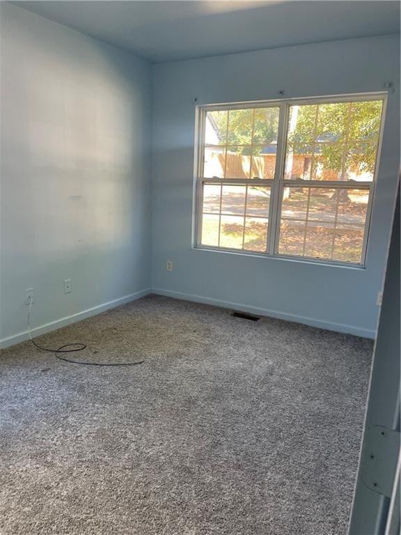 view of carpeted spare room