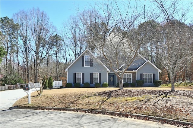 traditional home with fence