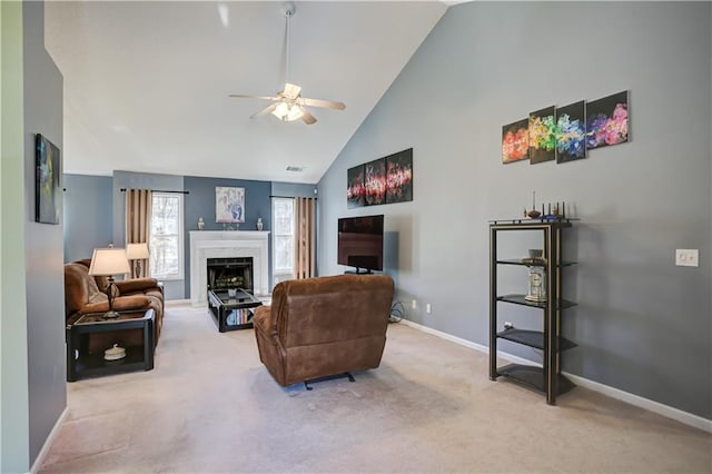 living area featuring a high end fireplace, carpet, high vaulted ceiling, and baseboards