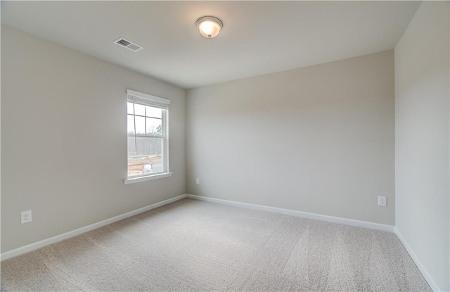 view of carpeted spare room