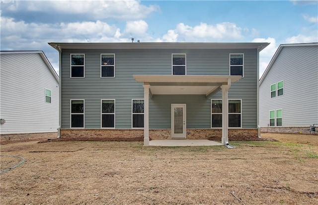 rear view of property featuring a lawn, a patio area, ceiling fan, and central AC unit