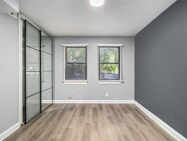 unfurnished bedroom featuring light hardwood / wood-style flooring