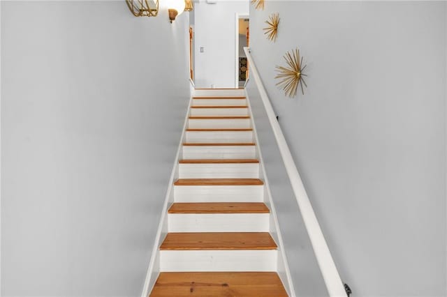 5989 Turfway Park Ct, Sugar Hill, GA 30518 - staircase featuring wood finished floors