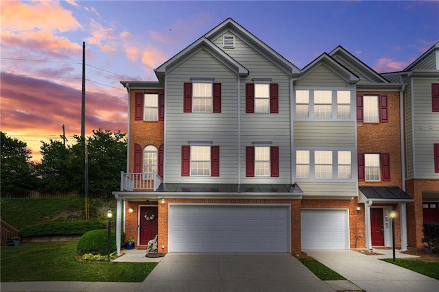 5989 Turfway Park Ct, Sugar Hill, GA 30518 - view of property with an attached garage, driveway, and brick siding