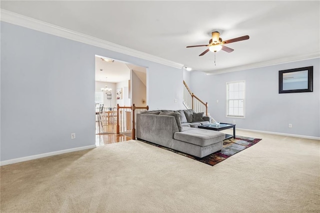 5989 Turfway Park Ct, Sugar Hill, GA 30518 - carpeted living area featuring ornamental molding, a chandelier, baseboards, ceiling fan, and stairway
