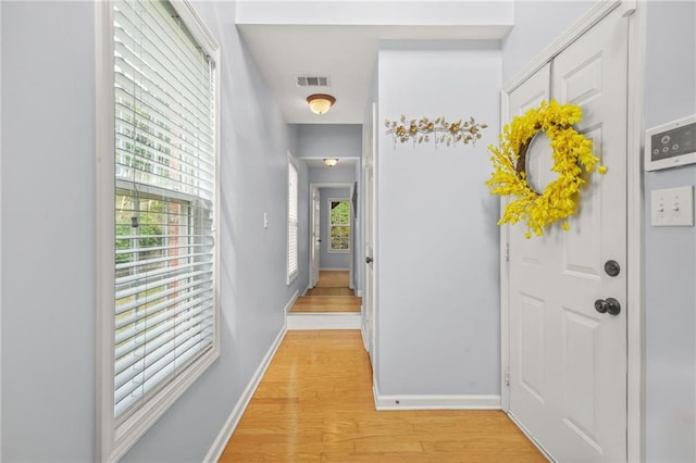 5989 Turfway Park Ct, Sugar Hill, GA 30518 - corridor with light wood finished floors and baseboards