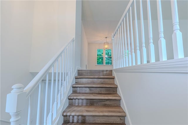159 Aztec Way SE, Acworth, GA 30102 - staircase with a chandelier