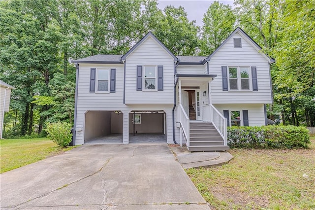 159 Aztec Way SE, Acworth, GA 30102 - raised ranch with driveway, a front yard, an attached garage, and view of scattered trees