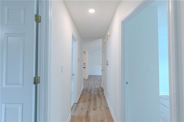 159 Aztec Way SE, Acworth, GA 30102 - hallway with light wood-type flooring, baseboards, and recessed lighting