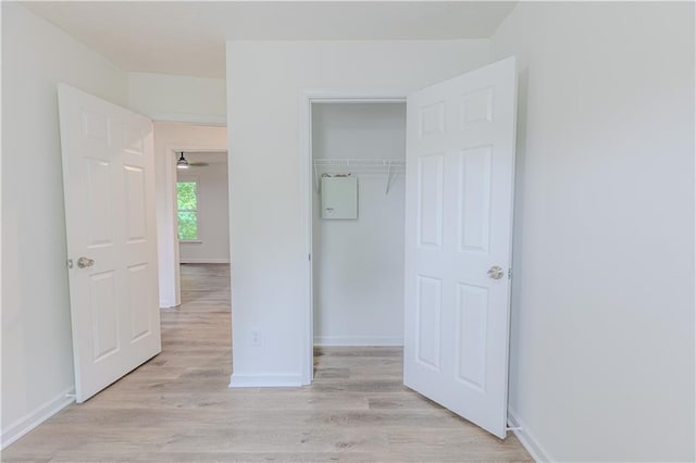 159 Aztec Way SE, Acworth, GA 30102 - unfurnished bedroom featuring light wood-style flooring, baseboards, and a closet