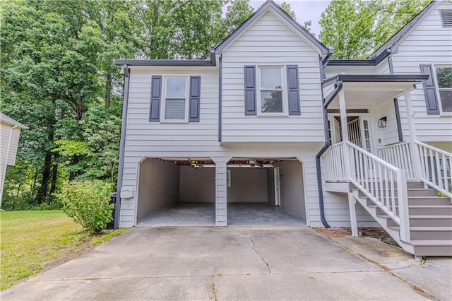 159 Aztec Way SE, Acworth, GA 30102 - view of front facade with concrete driveway and a garage