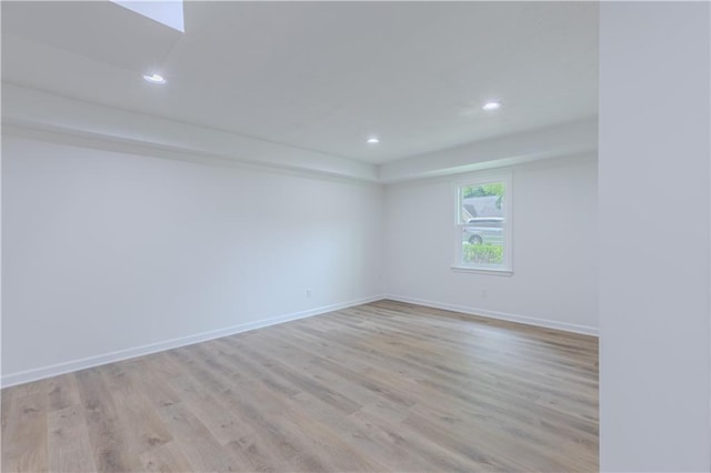 159 Aztec Way SE, Acworth, GA 30102 - spare room featuring light wood-style flooring, baseboards, and recessed lighting