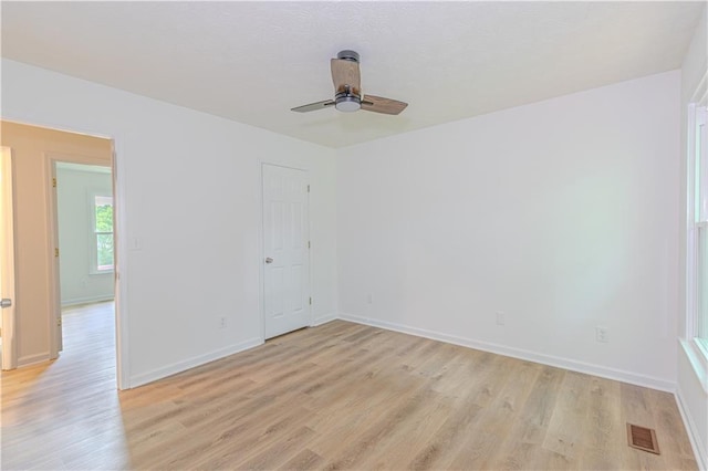 159 Aztec Way SE, Acworth, GA 30102 - unfurnished room featuring light wood finished floors, ceiling fan, and baseboards
