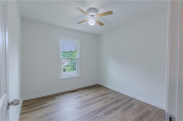 159 Aztec Way SE, Acworth, GA 30102 - spare room with a ceiling fan, wood finished floors, baseboards, and a textured ceiling