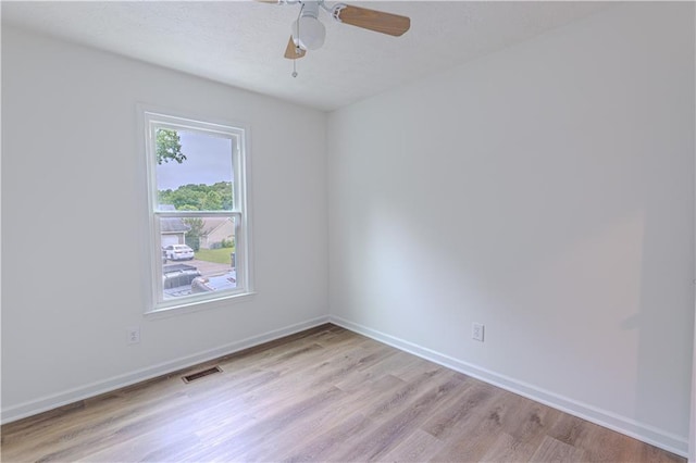 159 Aztec Way SE, Acworth, GA 30102 - unfurnished room with light wood-type flooring, ceiling fan, and baseboards