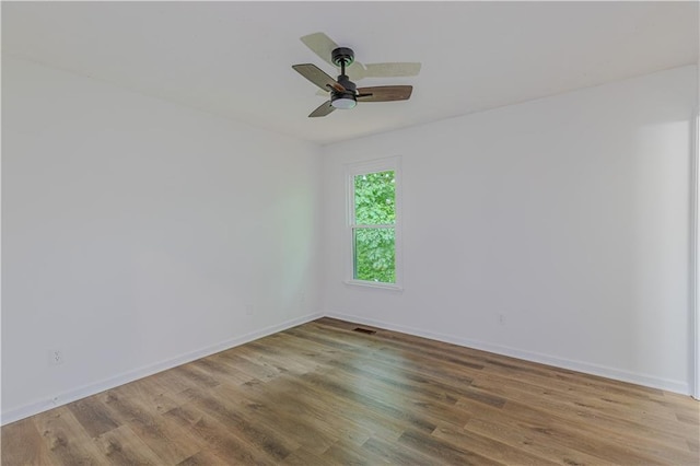 159 Aztec Way SE, Acworth, GA 30102 - unfurnished room with wood finished floors, baseboards, and a ceiling fan