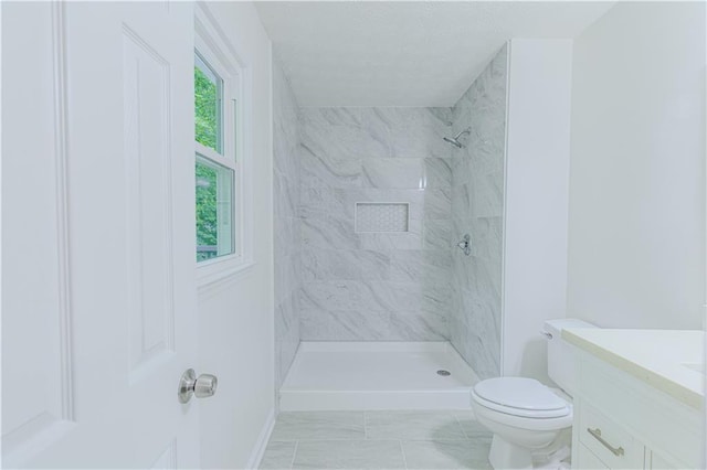 159 Aztec Way SE, Acworth, GA 30102 - full bath featuring toilet, a tile shower, vanity, and baseboards