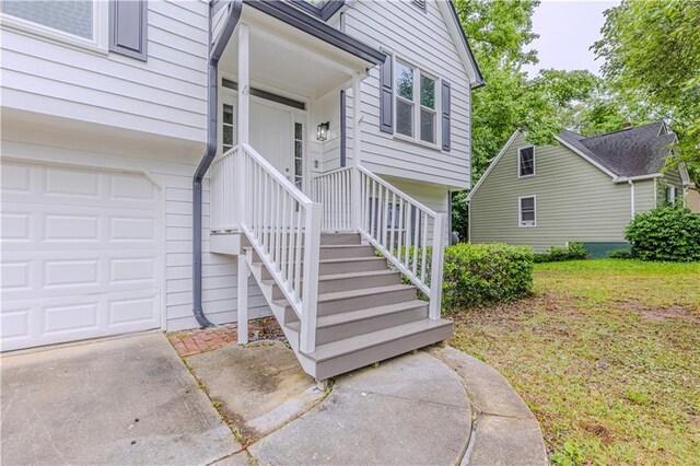 159 Aztec Way SE, Acworth, GA 30102 - entrance to property featuring concrete driveway, a lawn, and a garage