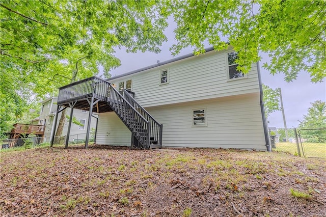159 Aztec Way SE, Acworth, GA 30102 - rear view of property with stairway and a wooden deck