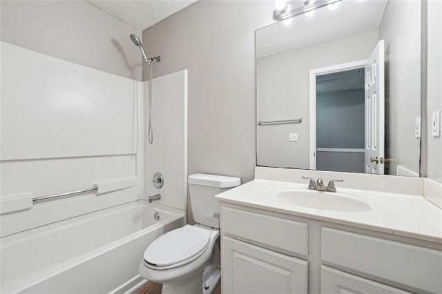 full bathroom featuring toilet, vanity, shower / bathtub combination, and a textured ceiling