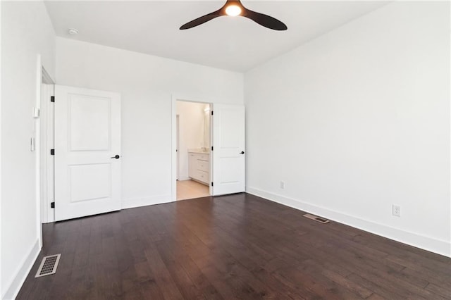 443 Plateau Pl NW, Atlanta, GA 30309 - unfurnished bedroom featuring baseboards, wood finished floors, visible vents, and connected bathroom