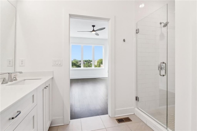 443 Plateau Pl NW, Atlanta, GA 30309 - bathroom with ceiling fan, visible vents, and a stall shower