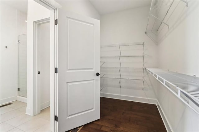 443 Plateau Pl NW, Atlanta, GA 30309 - spacious closet featuring visible vents and light wood-style flooring