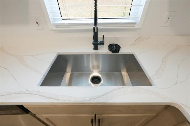 details with light stone counters and sink