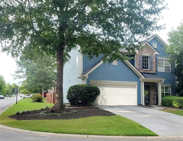 view of front of home with a garage